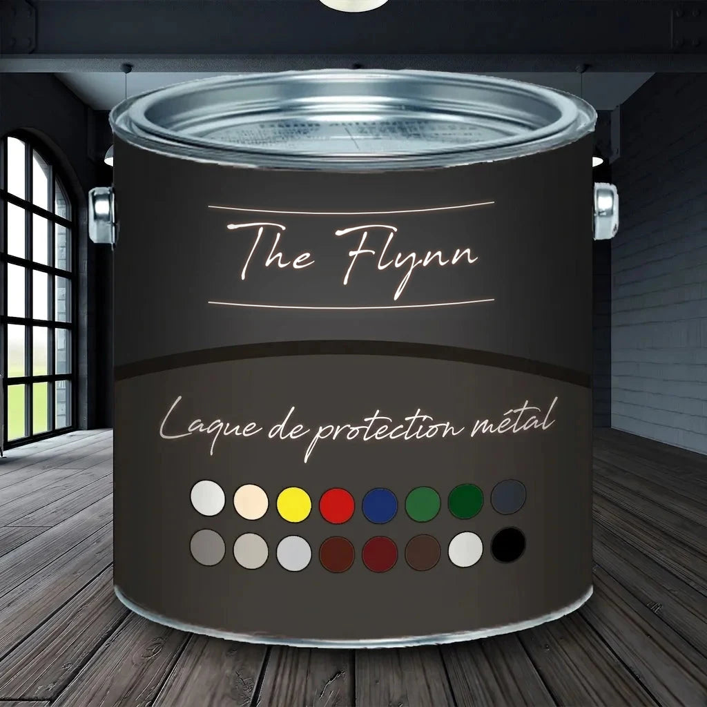 Pot de peinture gris foncé 'The Flynn Metallschutzlack' avec nuancier, sur plancher en bois.